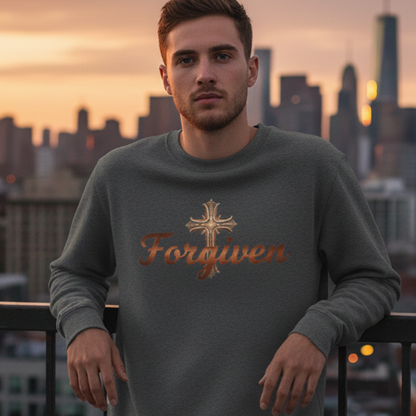 Man wearing a gray sweatshirt with 'Forgiven' text against a city skyline at sunset.