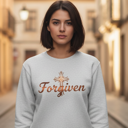 Woman wearing a gray sweatshirt with 'Forgiven' text on a street.